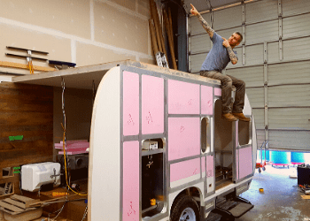 custom tear drop trailer with pink insulation and plastic frame work