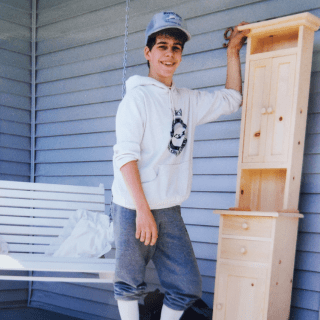 teenager with cabinet