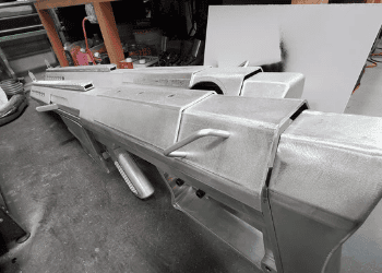 Custom aluminum body components under fabrication for the Barrett Truck, a fully custom 1998 Peterbilt conversion, shown in the workshop